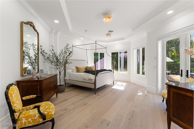 bedroom featuring ornamental molding, french doors, access to outside, and light hardwood / wood-style flooring