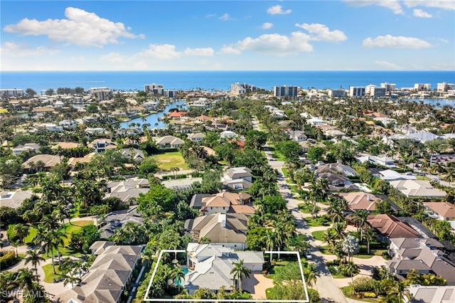 drone / aerial view with a water view