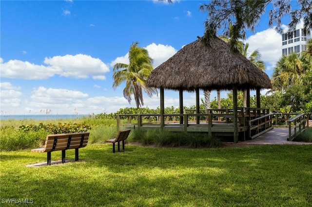 view of community featuring a gazebo and a lawn