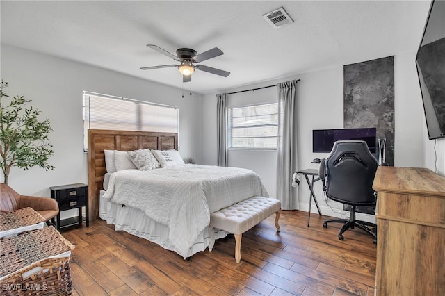 bedroom featuring dark wood-type flooring and ceiling fan