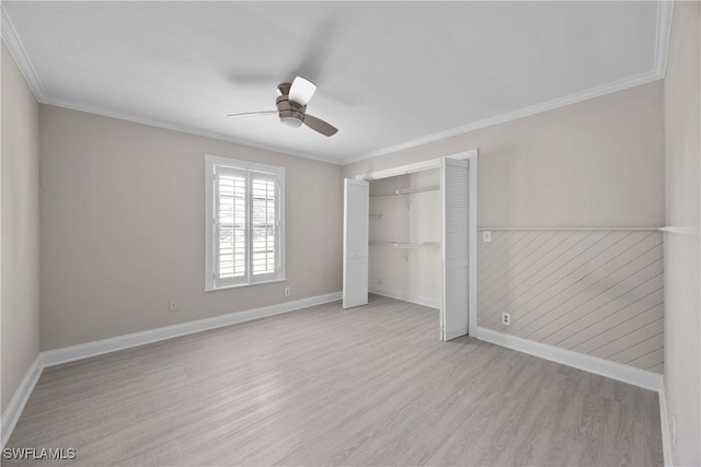 unfurnished bedroom with ornamental molding, light hardwood / wood-style floors, a closet, and ceiling fan