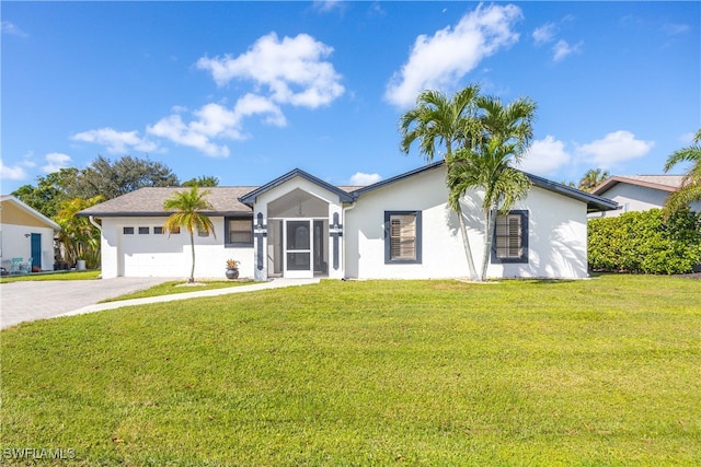 single story home featuring a front yard and a garage