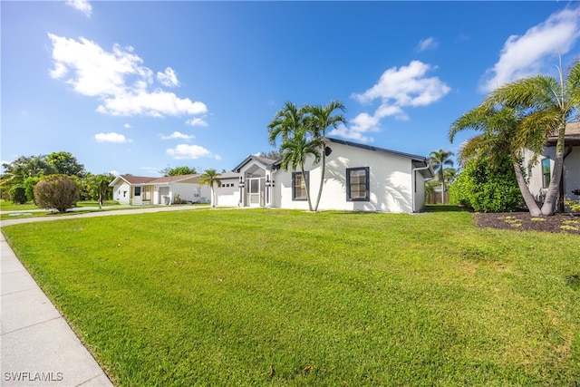 view of front of home with a front lawn