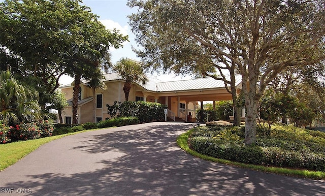 view of front of house featuring a carport