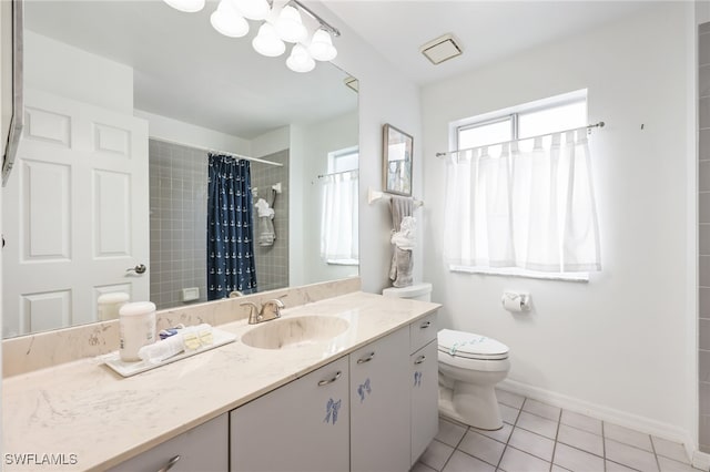 bathroom featuring vanity, toilet, tile patterned floors, and a shower with shower curtain