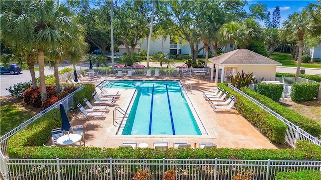 view of swimming pool with a patio area