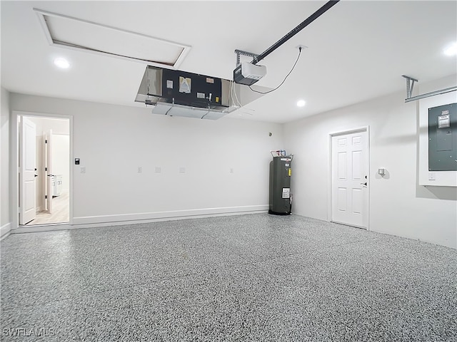 garage featuring a garage door opener, electric water heater, and electric panel