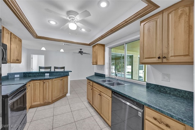 kitchen featuring sink, black appliances, kitchen peninsula, and a raised ceiling