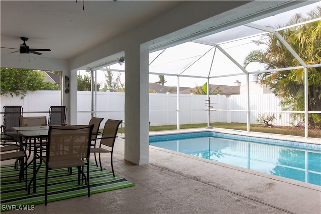 view of swimming pool featuring a patio area, a fenced in pool, a lanai, and a fenced backyard