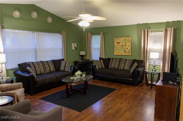 living room featuring lofted ceiling, ceiling fan, and dark hardwood / wood-style flooring