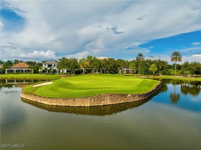 surrounding community featuring a water view