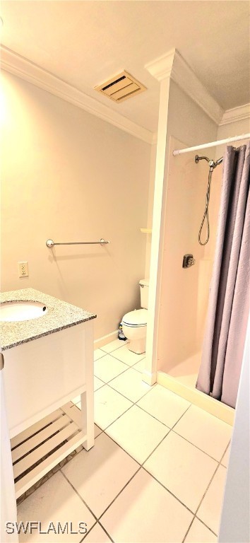 bathroom with curtained shower, vanity, toilet, and crown molding