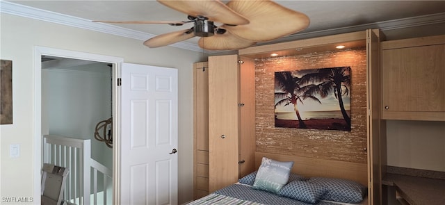 bedroom featuring ceiling fan and crown molding