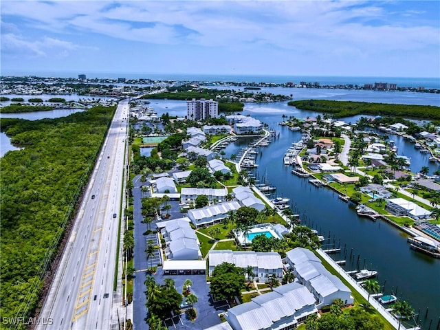 bird's eye view with a water view