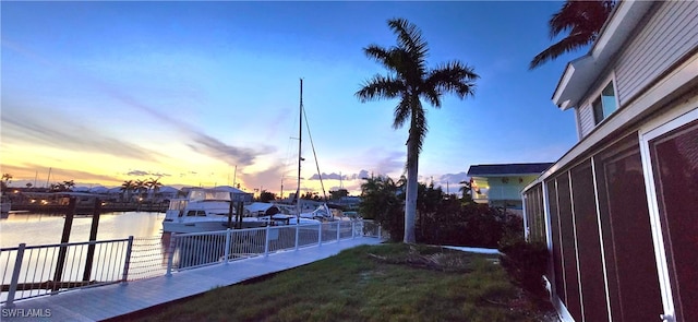 yard at dusk with a water view