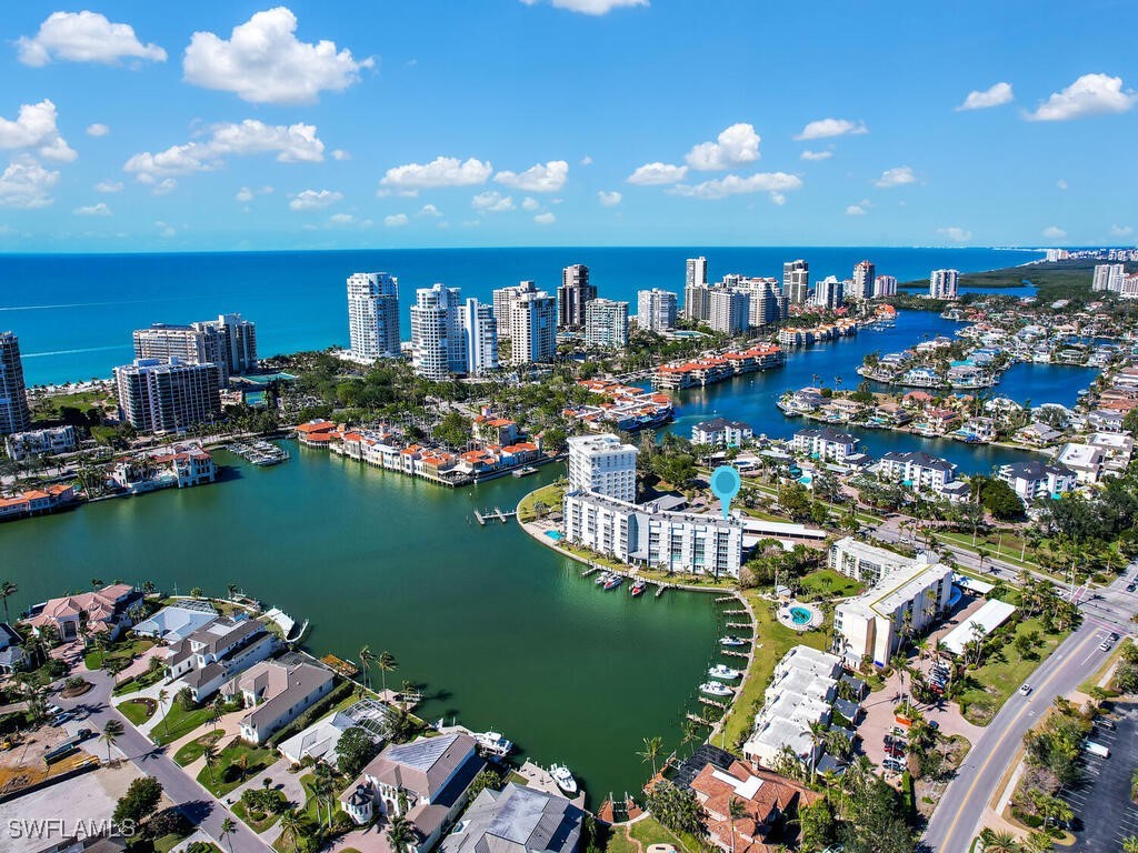 birds eye view of property featuring a water view