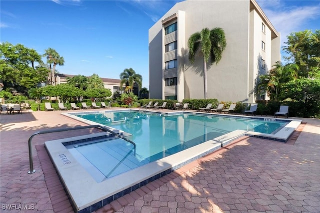 community pool with a patio