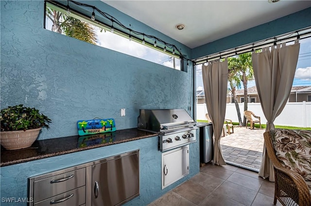 view of patio / terrace with a grill and exterior kitchen