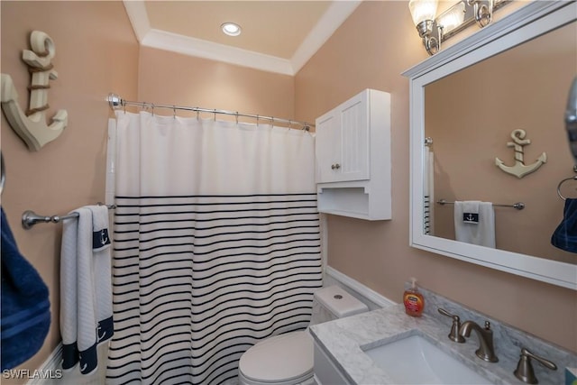 bathroom featuring walk in shower, crown molding, vanity, and toilet