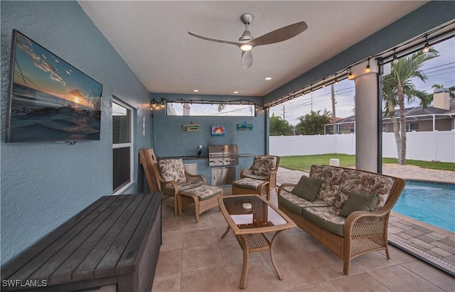 sunroom / solarium with ceiling fan