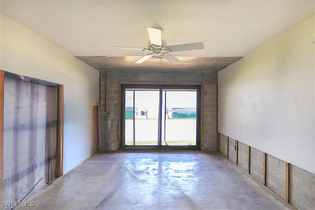 spare room featuring ceiling fan