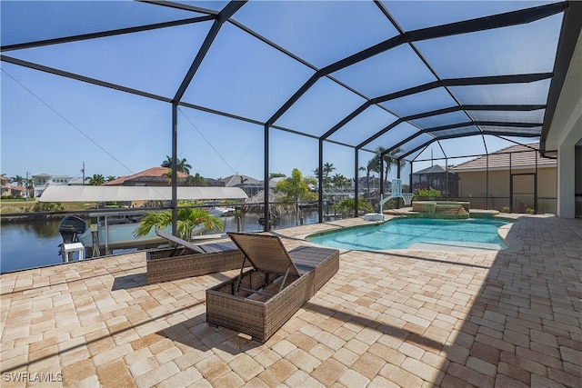 view of pool featuring a water view, a patio, and a lanai