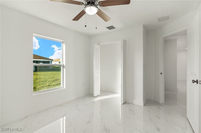 empty room with ceiling fan