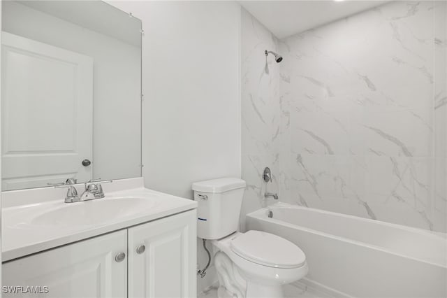 full bathroom featuring tiled shower / bath combo, toilet, and vanity