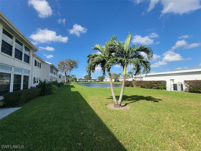 view of yard with a water view