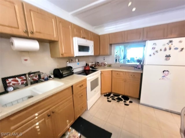 kitchen with light tile patterned floors, white appliances, crown molding, and sink