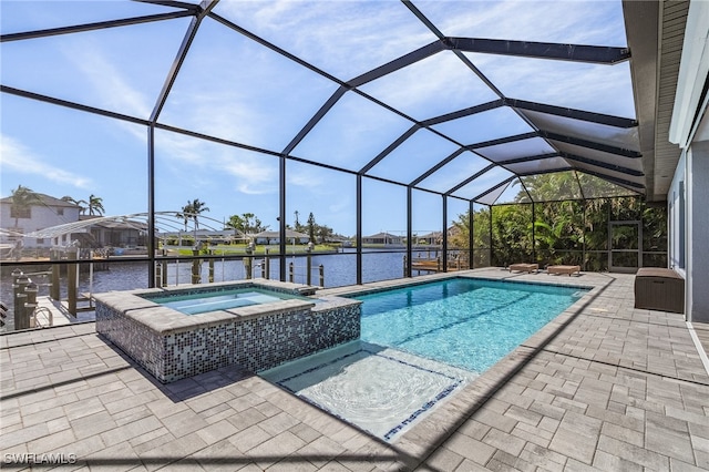 view of swimming pool featuring a patio, an in ground hot tub, a water view, and glass enclosure