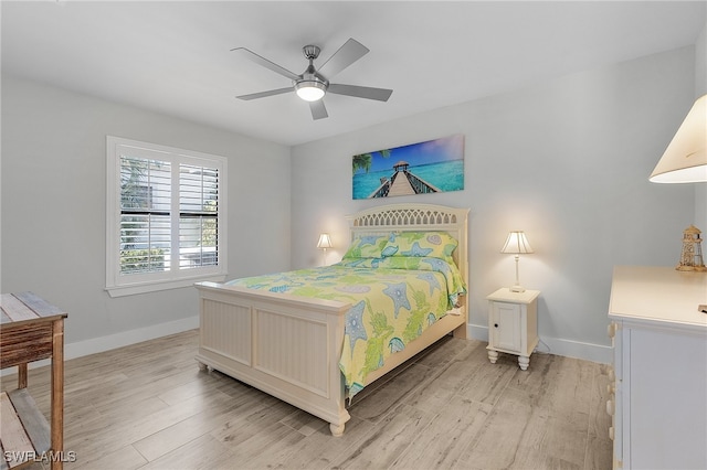 bedroom featuring light wood-type flooring and ceiling fan