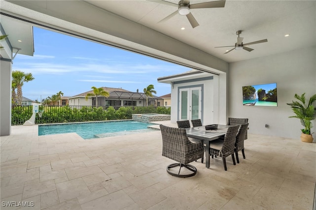 view of pool featuring a patio area, french doors, and ceiling fan