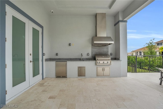 view of patio / terrace with french doors, exterior kitchen, sink, and a grill