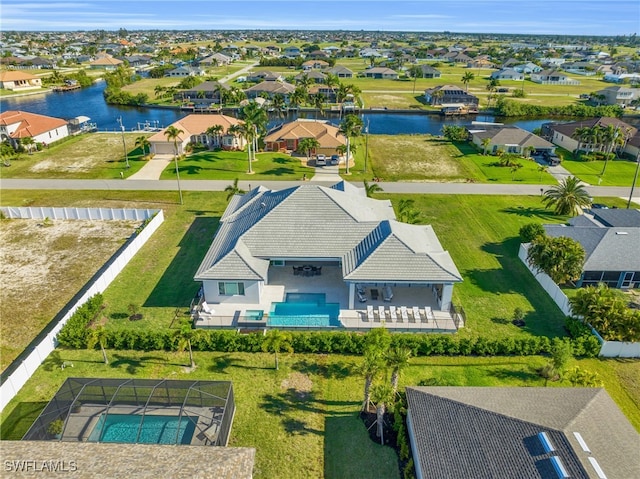 drone / aerial view featuring a water view