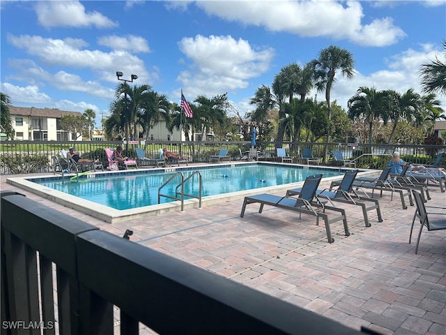 view of swimming pool with a patio area