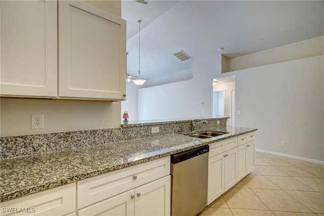 kitchen with white cabinetry, sink, hanging light fixtures, dishwasher, and light stone countertops