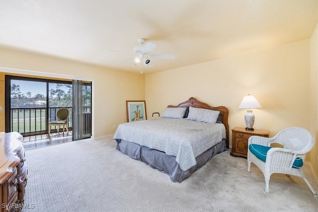 bedroom featuring access to exterior, ceiling fan, and light colored carpet