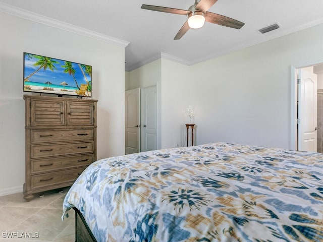 tiled bedroom with ceiling fan and ornamental molding