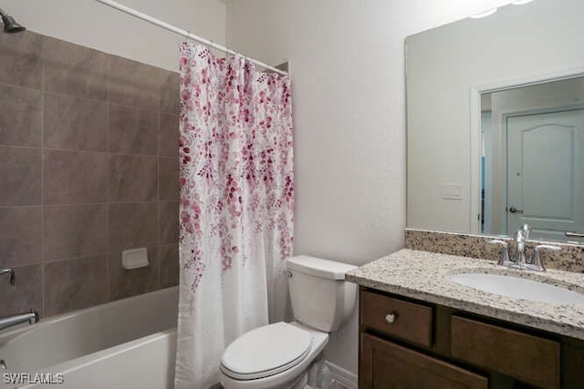 full bathroom with toilet, shower / bathtub combination with curtain, and vanity