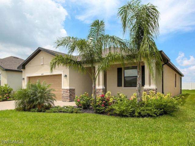 view of front of house featuring a front yard and a garage