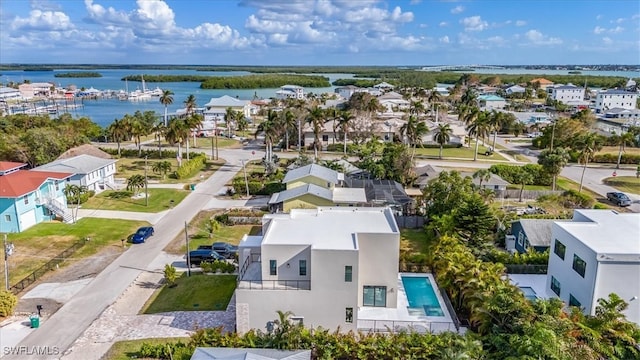 aerial view with a water view and a residential view