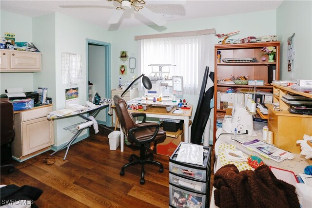 office area with ceiling fan and dark hardwood / wood-style flooring