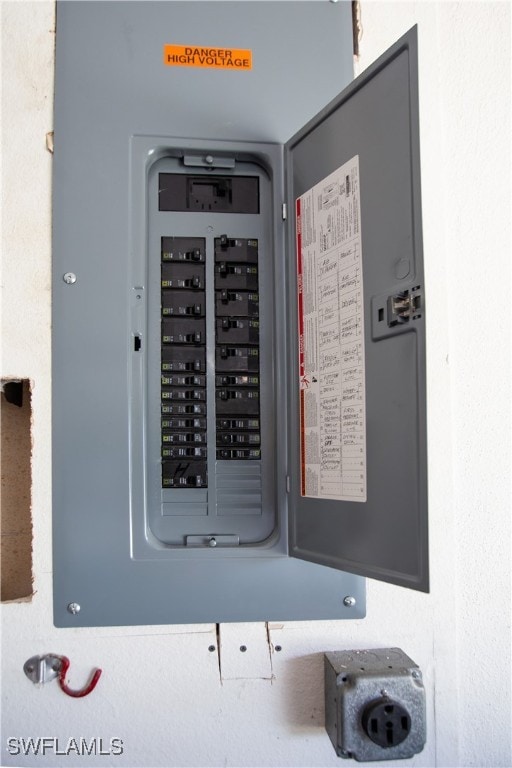 utility room featuring electric panel