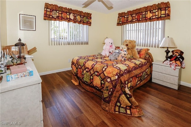 207 SE 20th Pl, Cape Coral, FL 33990 - bedroom with wood finished floors, baseboards, and a ceiling fan