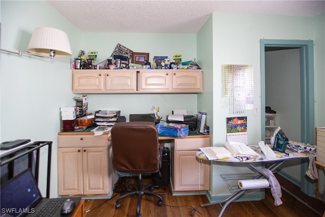 office area with a textured ceiling and wood-type flooring