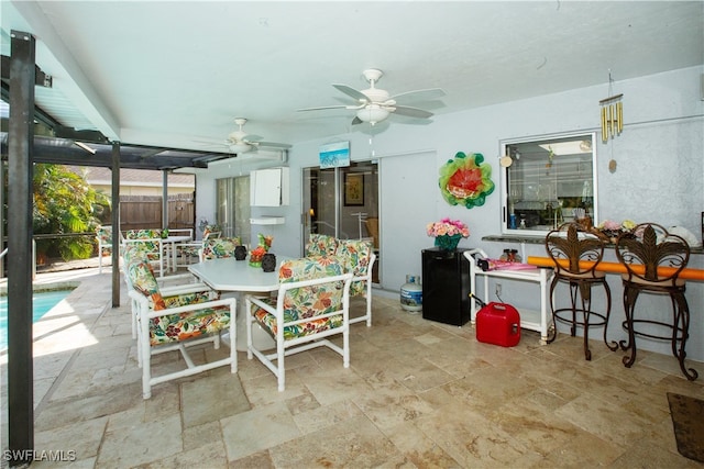 dining space featuring ceiling fan