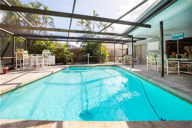 207 SE 20th Pl, Cape Coral, FL 33990 - view of pool featuring a patio, a fenced backyard, and a lanai