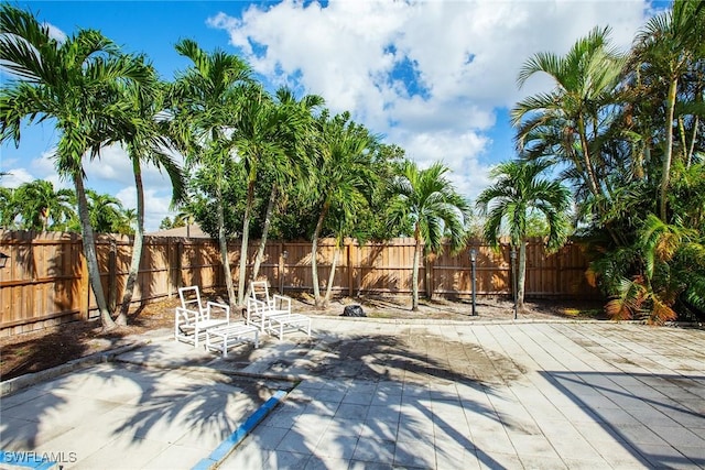 207 SE 20th Pl, Cape Coral, FL 33990 - view of patio / terrace with a fenced backyard