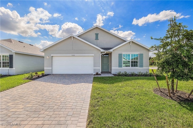 single story home with a front lawn and a garage